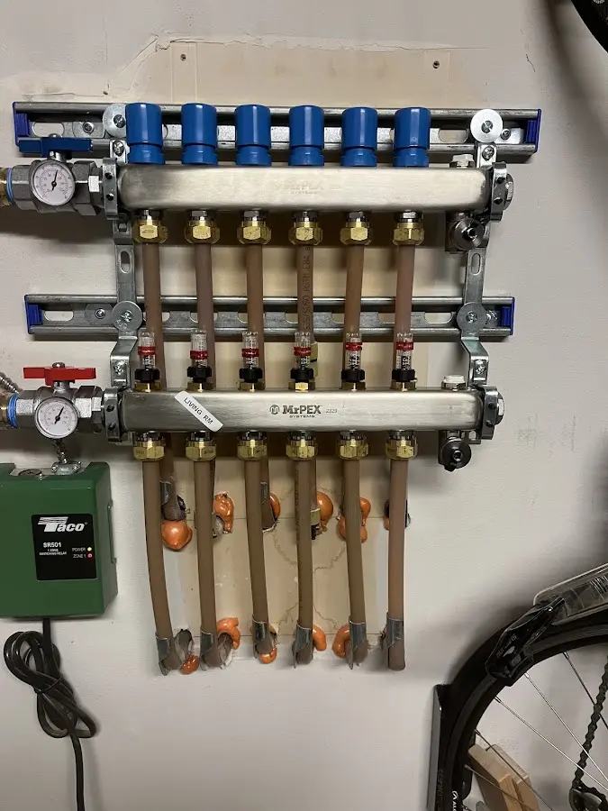 Plumber performing Gas Line Installation at a residential property in Northfield